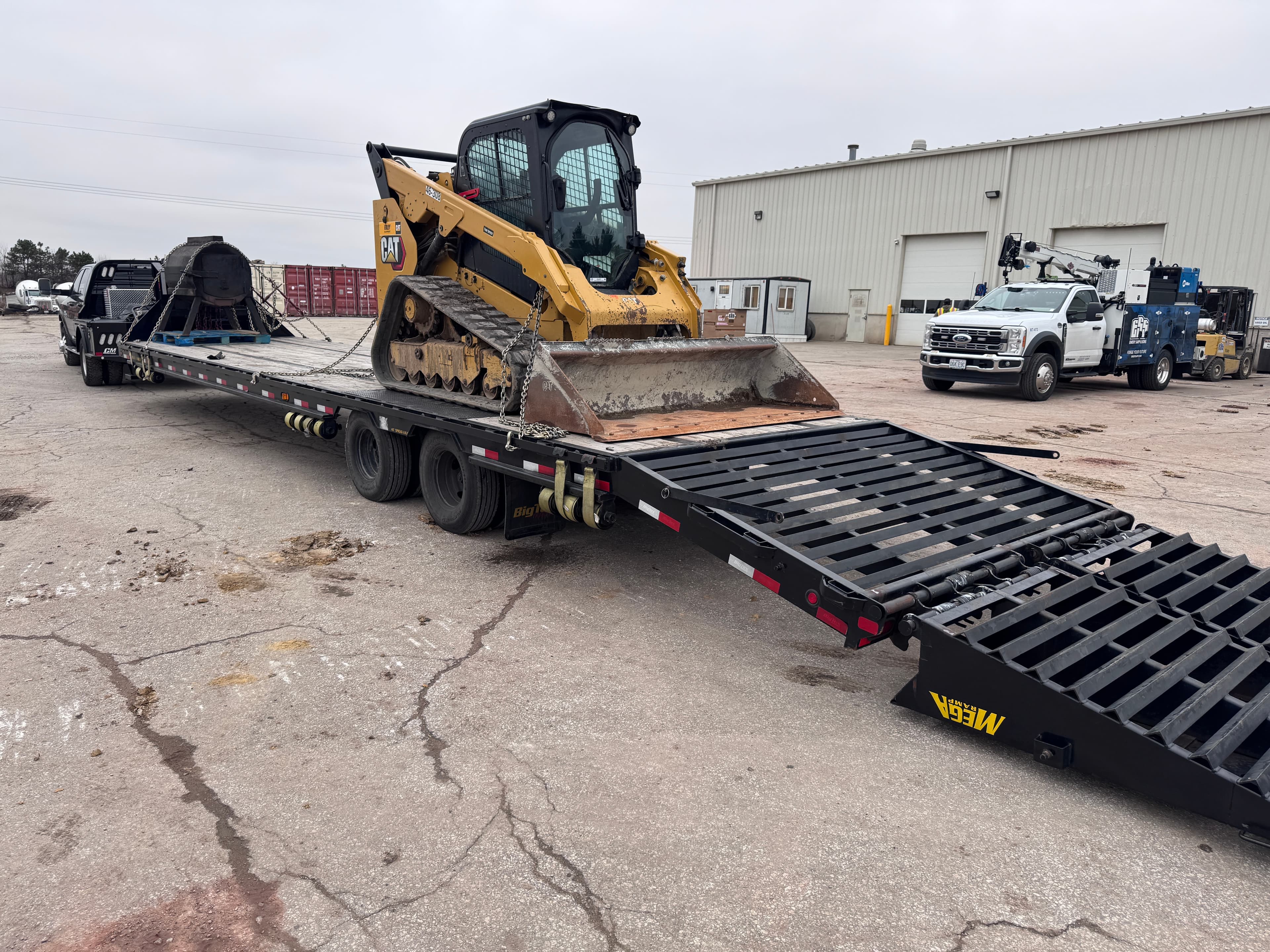CAT Skid Steer — Lowboy